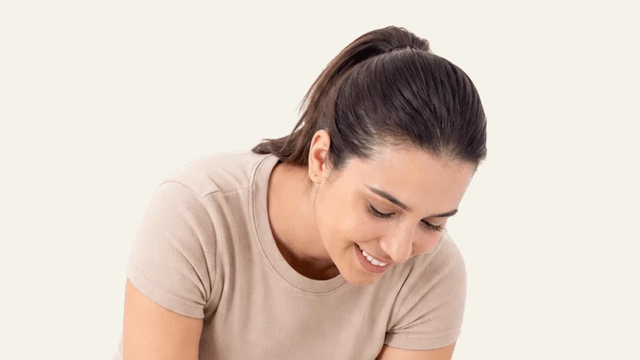 A parent comforting a baby with a gentle back massage during the four month regression